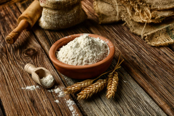 istock ears of wheat and white flour 913508510