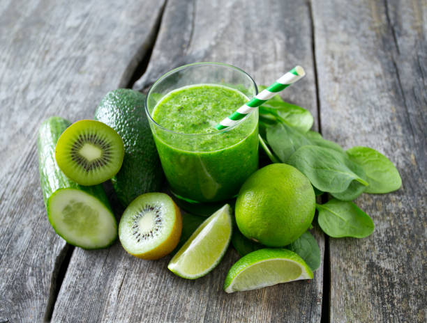 istock fresh green smoothie on wooden surface 913519608