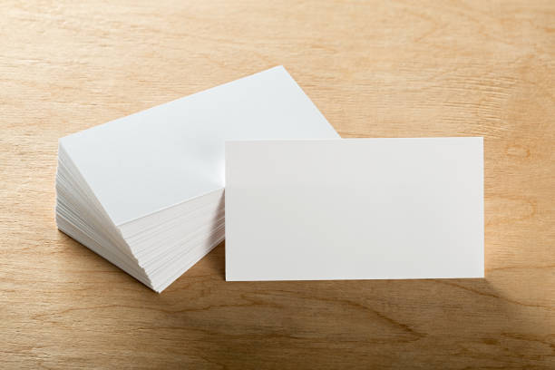 istock Blank business cards on a wooden surface 913521934