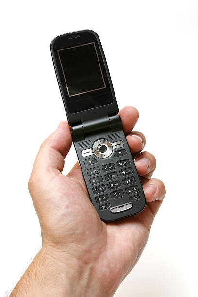 istock Holding a GSM cell phone 91352218