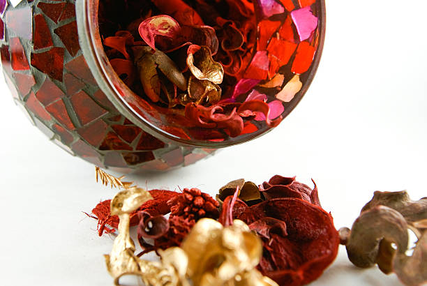 Garam Masala flowing from storage bottle