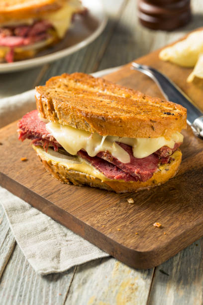 istock Savory Homemade Corned Beef Reuben Sandwich 913528666