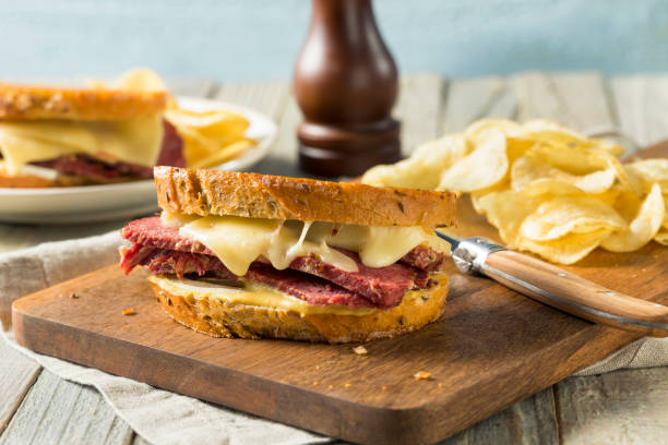 istock Savory Homemade Corned Beef Reuben Sandwich 913528806