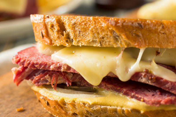 istock Savory Homemade Corned Beef Reuben Sandwich 913528880