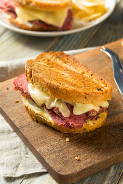istock Savory Homemade Corned Beef Reuben Sandwich 913529302