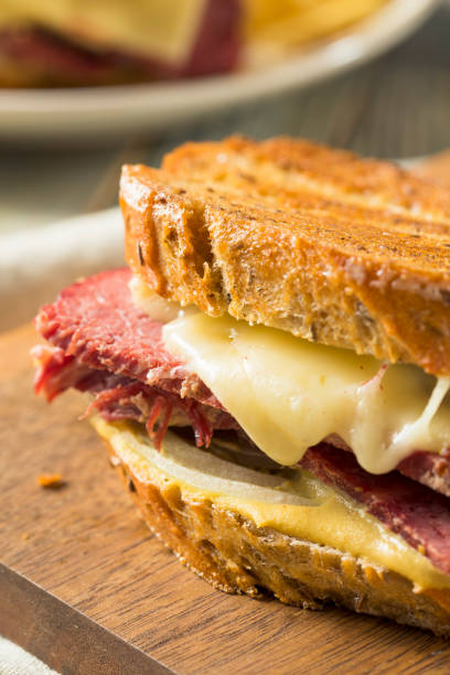 istock Savory Homemade Corned Beef Reuben Sandwich 913529572