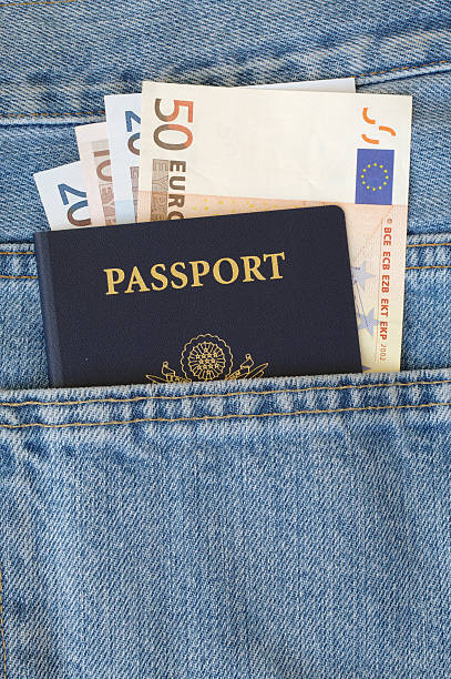 istock American passport with euros in jeans pocket 91353392