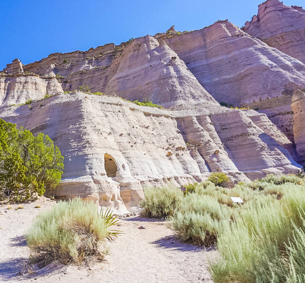 The rock formations in the canyons of the Kasha-Katuwe Tent Rocks National Monument near Cochiti, New Mexico A Cave Dwelling in Tent Rocks National Monument Park near Cochiti, New Mexico kasha katuwe tent rocks stock pictures, royalty-free photos & images