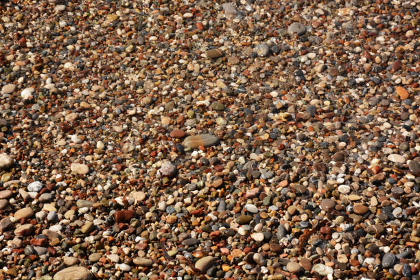 istock Pebble colorful small stone background 913534396