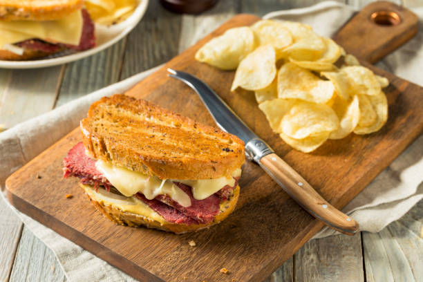 istock Savory Homemade Corned Beef Reuben Sandwich 913535082