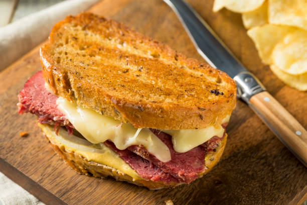 istock Savory Homemade Corned Beef Reuben Sandwich 913535270
