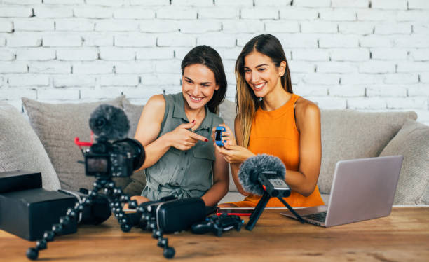 istock Two women reviewing smart watches 913537388