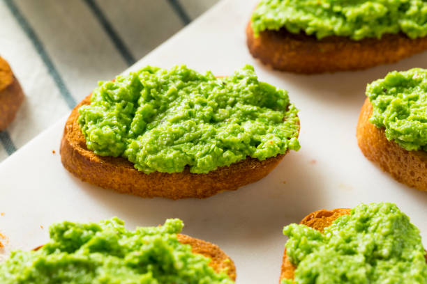 Sweet Homemade Pea Pesto Crostinis Ready to Eat