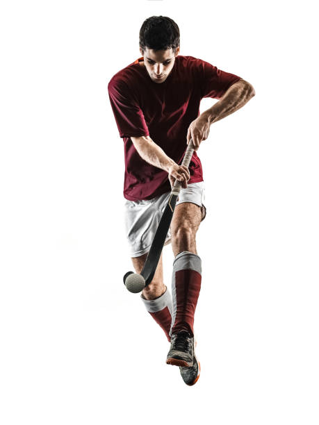 istock field hockey player man isolated silhouette white background 913538398