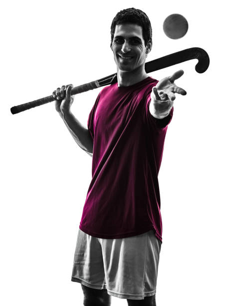istock field hockey player man isolated silhouette white background 913538470
