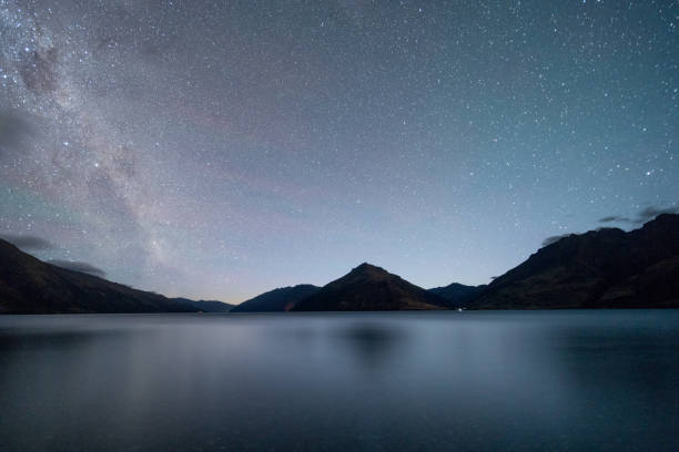 istock Lake Wakatipu night sky with milky way 913549530