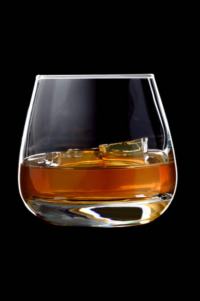 istock The glass of cognac or brandy with ice. 913557206