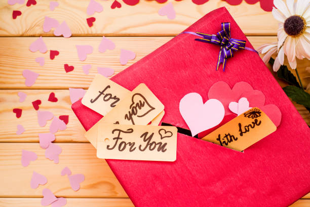 istock valentine's day red gift box with a gap for paper valentines 913567320