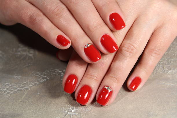 istock Women's hands with a stylish manicure. 913569010