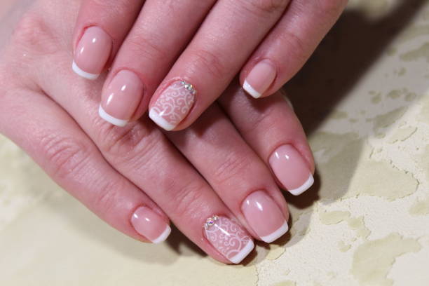 istock Manicure design of white french 913570570