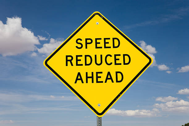 istock Road sign speed reduced ahead 91357453