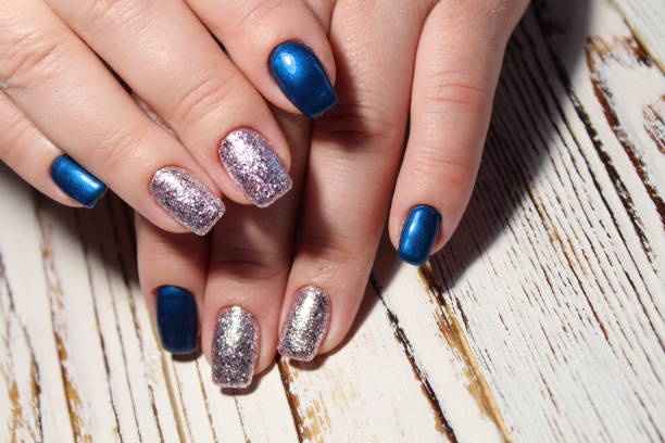 istock Christmas design manicure with snowflakes. 913574636