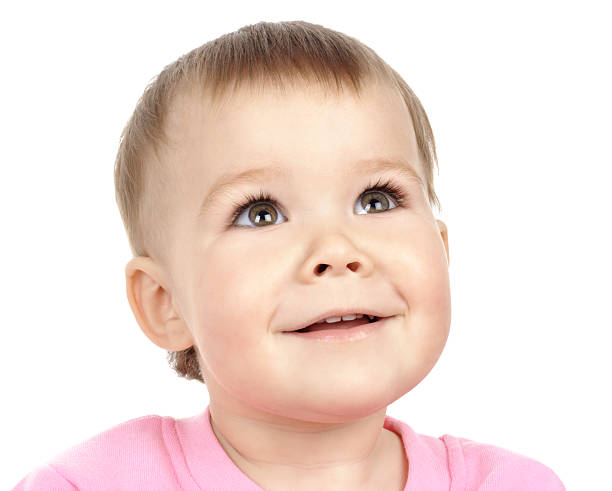 istock Cute child looking up and smiling 91357699