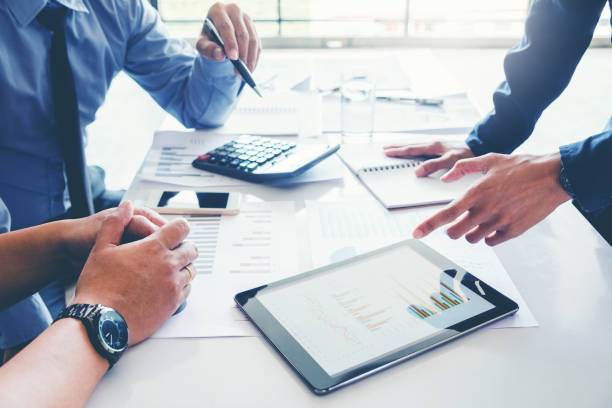 istock Business team meeting working on digital tablet new business project 913589010