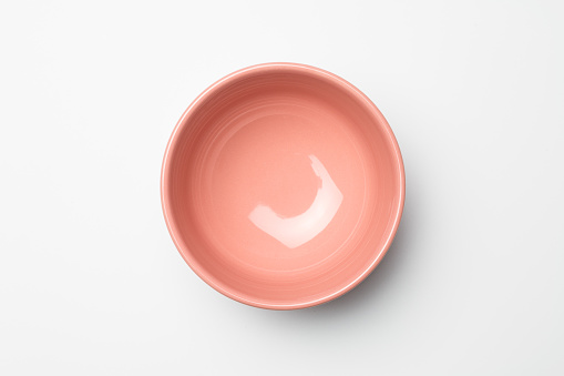 Pink bowl on white background