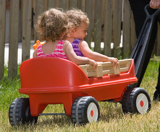istock People - Happy Twin Toddlers Going For A Ride 91359707