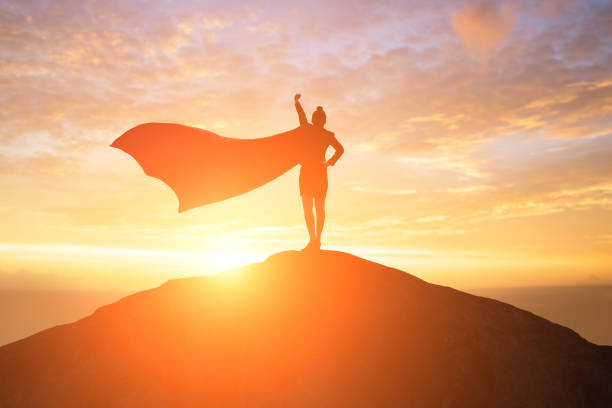 super business woman on mountain silhouette of super business woman look somewhere on the mountain powerful women stock pictures, royalty-free photos & images