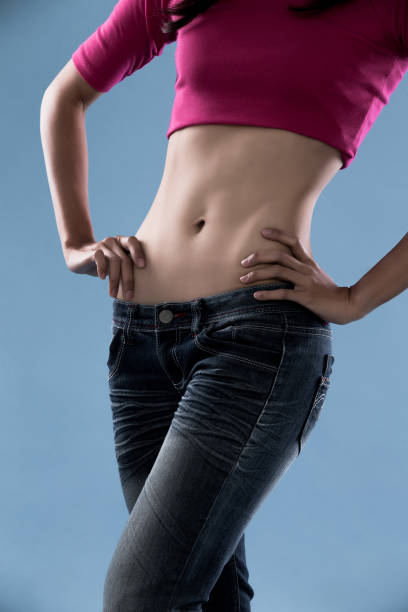 istock close up woman waist 913602956