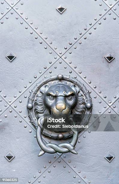 Medieval Door Knocker Used Up Stock Photo - Download Image Now - Door Knocker, Aging Process, Animal Head