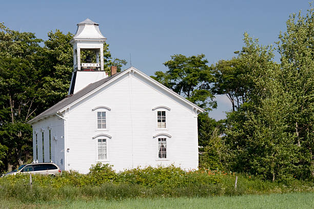 istock White Country Church in Rural Setting 91360392