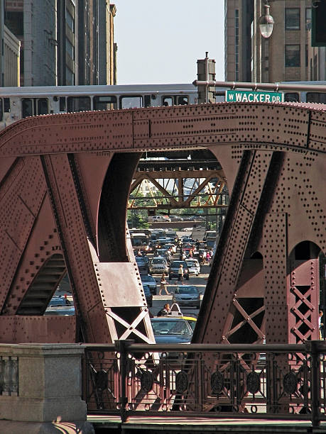 istock Traffic and Elevated Train Behind Chicago River Bascule Bridge Truss 91360402