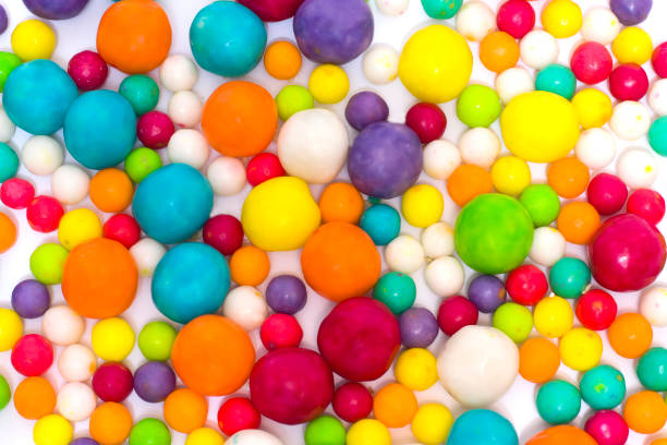 Multi-colored sweets on a white background.