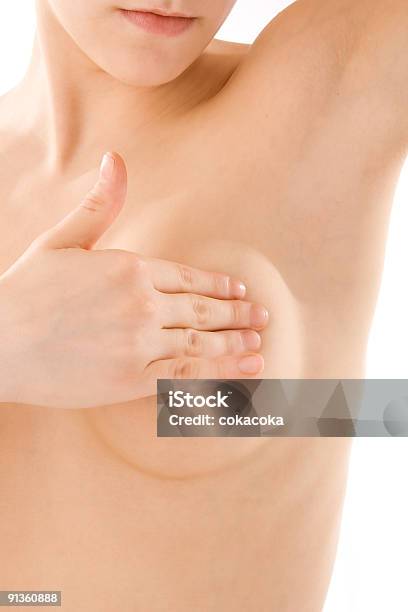 Woman Performing A Breast Selfexamination Stock Photo - Download Image Now - Adult, Alertness, Beautiful Woman