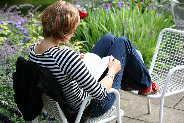 istock Female reading in the park 91361130