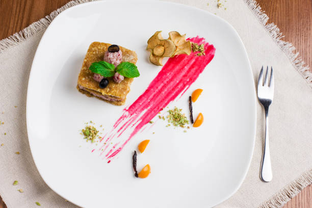 istock Raw vegan cake on a white plate. View from top 913613830