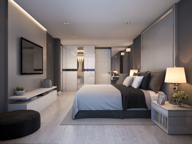 istock 3d rendering beautiful luxury bedroom suite in hotel with tv 913616568