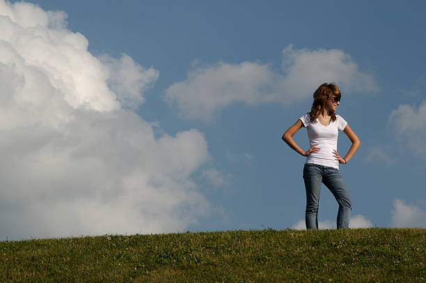 Girl on Hill stock photo