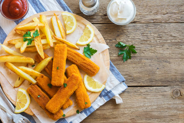 istock Fried Fish Sticks with French Fries 913622894