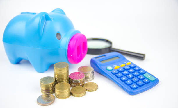 istock coin and calculator on business plan for finance ,banking 913623080