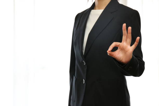 istock A woman with a hand sign 913626236
