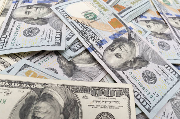 istock heap of dollars as background 913626704