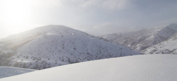 istock dawn sun in the snowy mountains 913626950