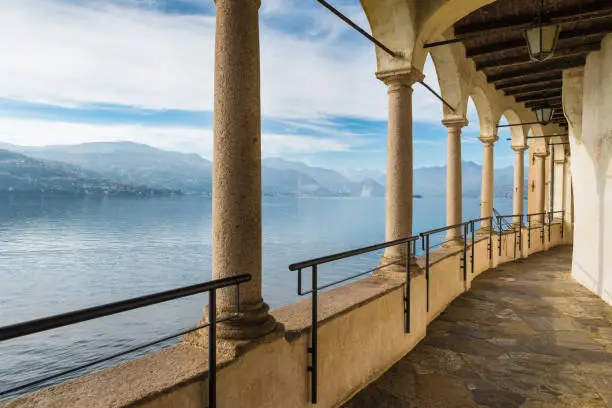 Photo of Colonnade of an ancient hermitage. Lake Maggiore from Hermitage of Santa Caterina del Sasso (XIII century), Italy