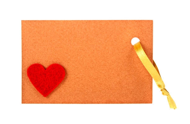 istock Brown paper label with red heart on white background 913634968