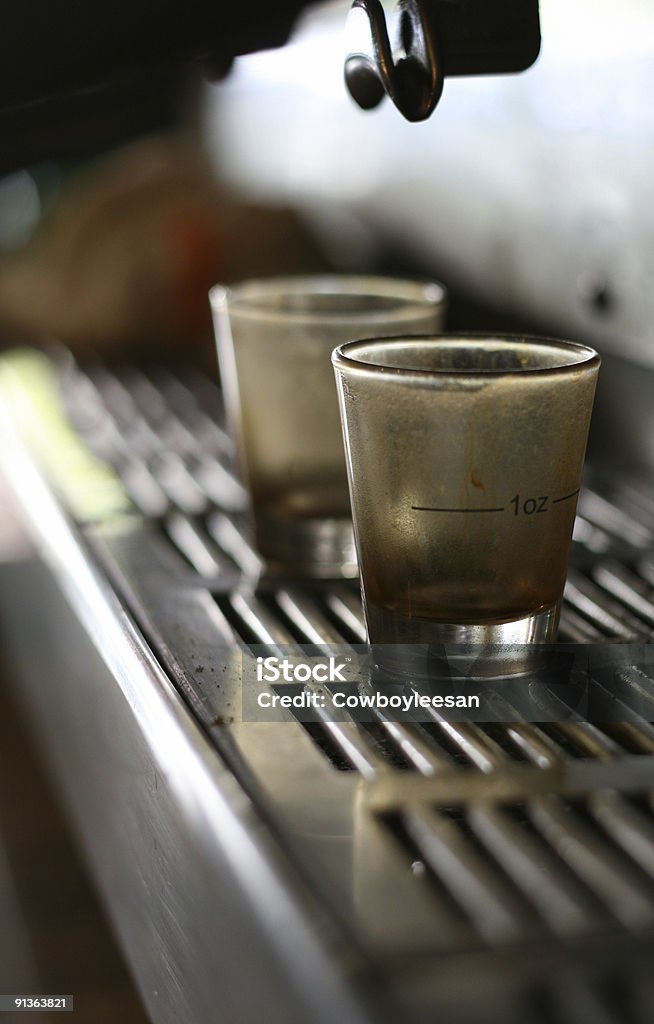 shotglasses on espresso machine American Culture Stock Photo