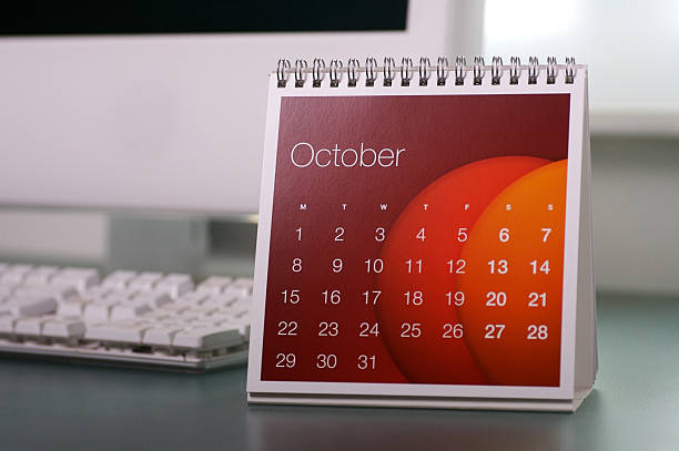 . oktober. - calendar february desk computer stock-fotos und bilder